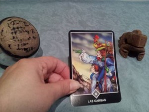 Significado de Las Cargas en una lectura de tarot Osho